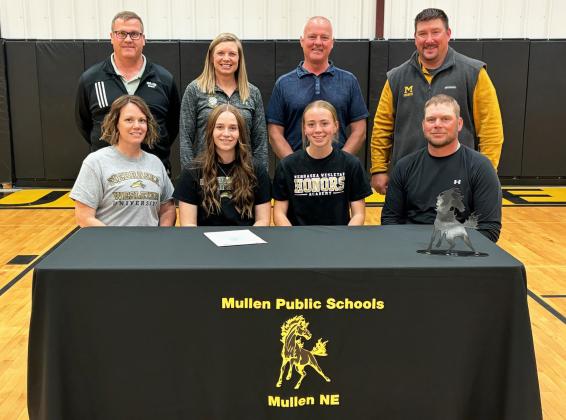 MHS senior Jadyn Andersen signed her letter of intent to play volleyball at Nebraska Wesleyan last Thursday, May 2. Pictured back, l-r: MHS Principal Mike Kvanvig, MHS Head Volleyball Coach Nichole Ourada, MHS Activities Director Phil Hoyt, MPS Superintendent Chris Kuncl. Front: Megan, Jadyn, Harper and Tim Andersen. Gerri Peterson